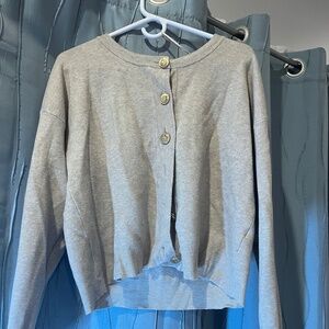 Two women’s cardigans
